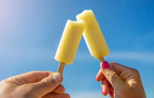 Hands holdingpopsicles