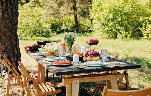 Festive table with foods and drinks