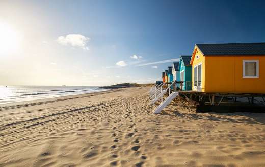 Small colorful buildings on sea