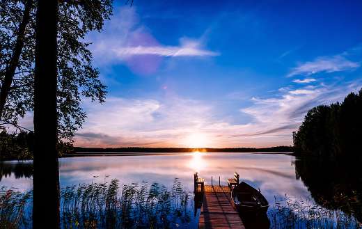Wooden pier with fishing boat