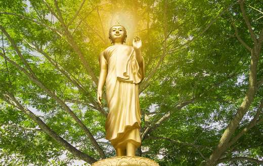 Isolated gold buddha statue Thailand