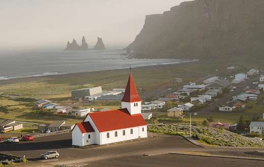 White and red church building