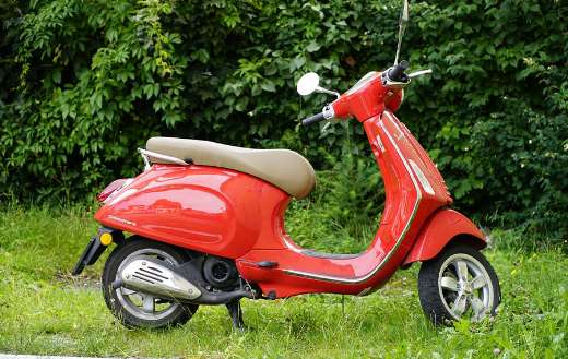 Vespa primavera red scooter