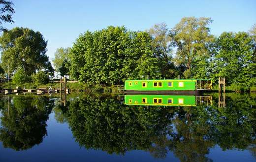 Boat house and nature reflection