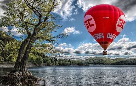 Hot air balloon by the lake
