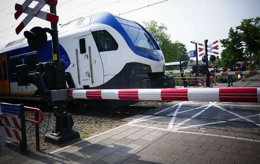 Train railways crossing Oss west Netherlands