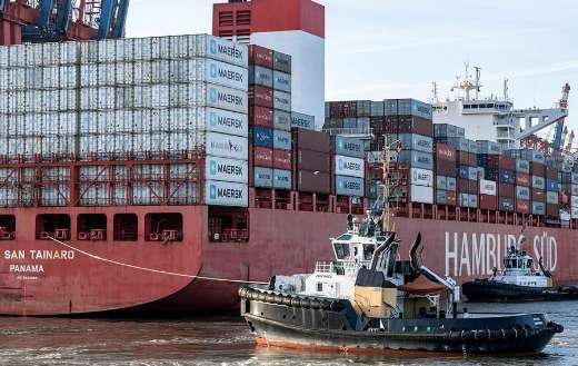 Huge container ship port land