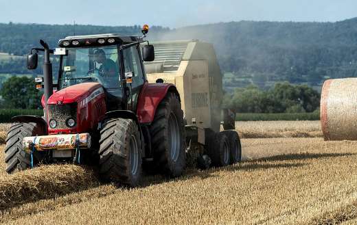 Harvesting machine vehicle straw bales