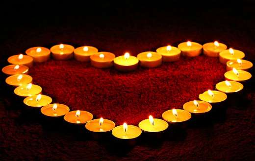Candles light heart shape