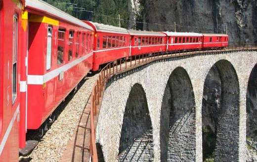 Landwasser viaduct in Switzerland red train