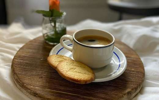 Fresh black coffee and cookies