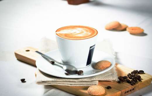 Hot cappucino coffee and cookies