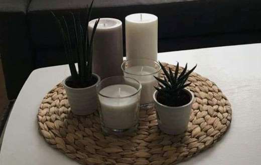 Decorative tray with candles and plants