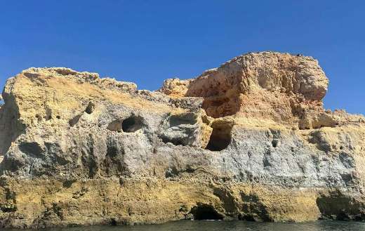 Sea cave on the coast of the Algarve in Portugal