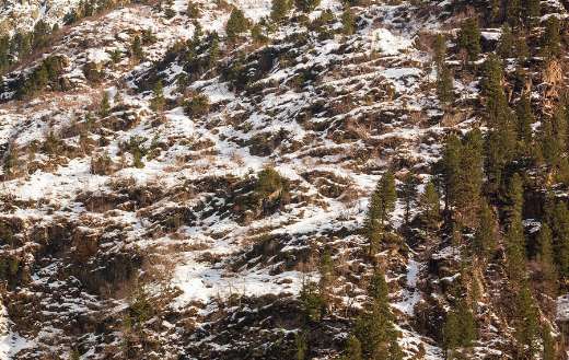 Snowy mountain landscape with steep slope