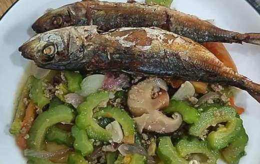 Asian dish vegetables fried fish