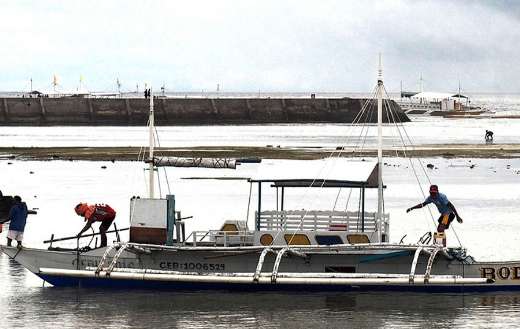 Outrigger fishing boat